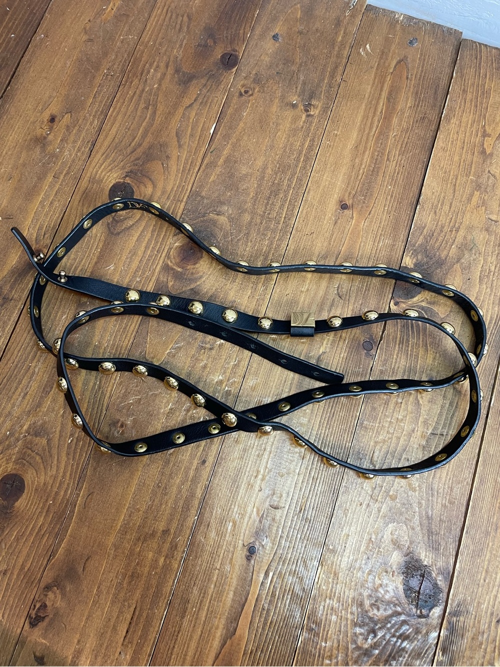 Diane Von Furstenberg size small black and gold tone skinny double wrap belt